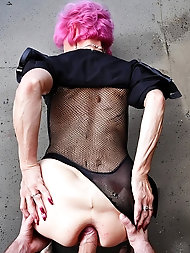 Russian granny with piercings and pink hair gets naked for BDSM fun